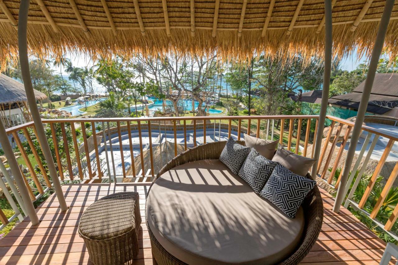 에덴 비치 리조트 앤 스파  카오락 외부 사진 The view from the balcony of a pool villa at the resort