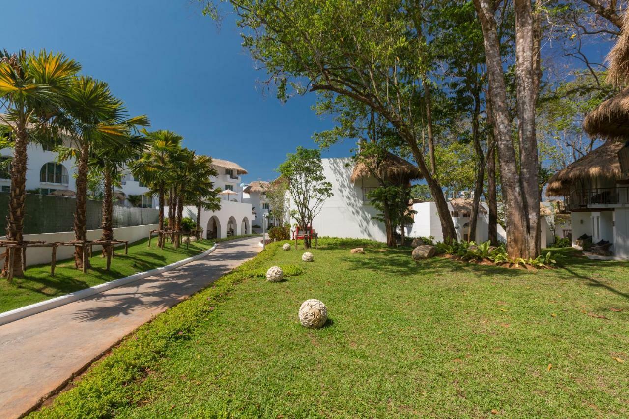 에덴 비치 리조트 앤 스파  카오락 외부 사진 The resort's grounds